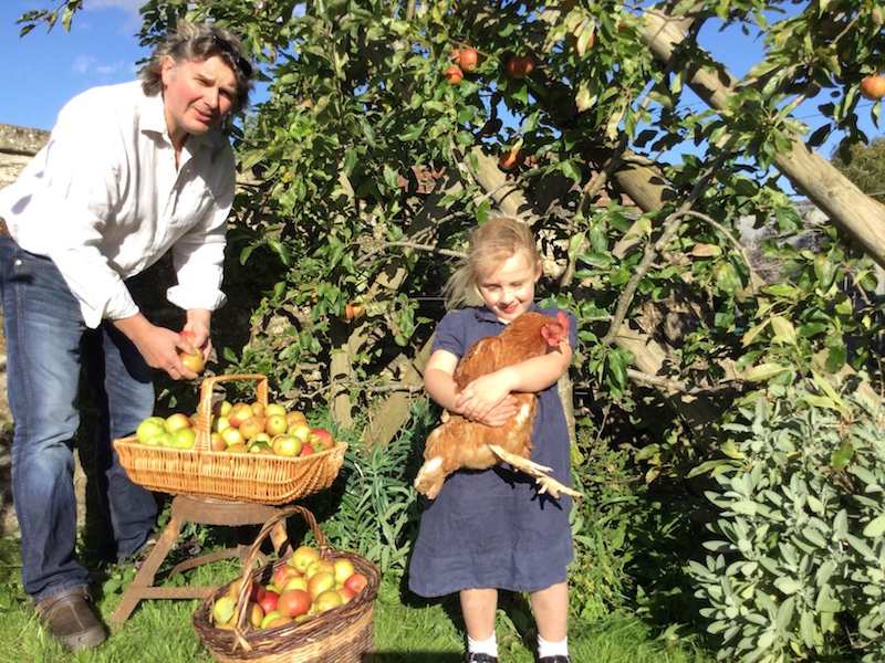 In the orchard with chickens